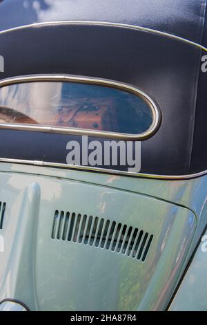 Beetle Rear Window Induction A Volkswagen Beetle with a small rear window, built in 1956, is on ...
