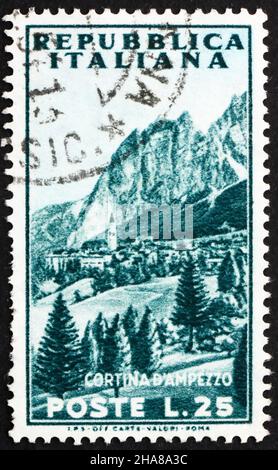 ITALY - CIRCA 1953: a stamp printed in the Italy shows View of Mountain, Cortina d'Ampezzo, circa 1953 Stock Photo