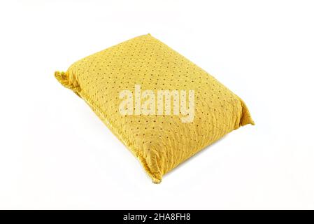 Old yellow sponge for washing glass and dishes, isolated on a white background. Stock Photo
