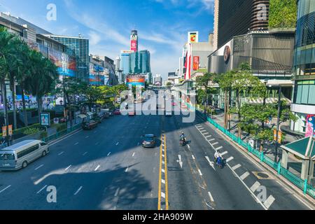 Bangkok, Thailand – December 2021: Bangkok downtown city center Siam area with shopping malls and traffic. Bangkok cityscape image. Stock Photo