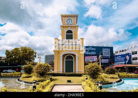 Phuket, Thailand - December 2021: Phuket Town Clock Tower in the roundabout in Phuket Town center, Thailand. A landmark of Phuket town, Stock Photo