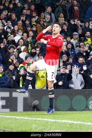 Norwich, UK. 11th Dec, 2021. Cristiano Ronaldo of Manchester United scores  the only goal of the game from the penalty spot during the Premier League  match between Norwich City and Manchester United