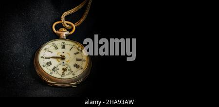 Antique decayed pocket watch on black velvet, banner design Stock Photo