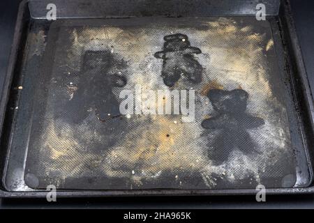 Empty baking sheet with shape of Grittibänz. It's pastry, made of sweet leavened dough, in the form of a man, available usually around Saint Nicholas' Stock Photo