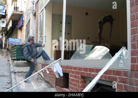 ISTANBUL, TURKEY - NOVEMBER 20: Demolished building after terror attack and bomb explosion in British Consulate on November 20, 2003 in Istanbul, Turkey. Killing 30 people and wounding 400 others. Stock Photo