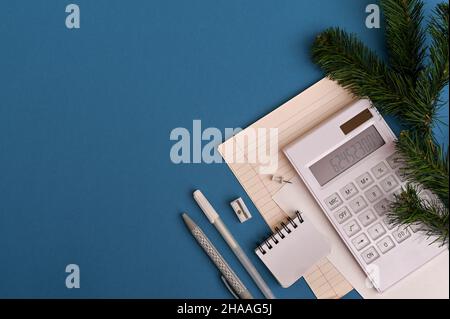 Business New Year's layout on a blue background. Top view, copy space Stock Photo