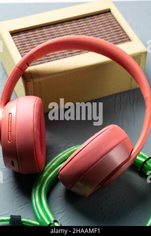 a red headphone on gray background Stock Photo