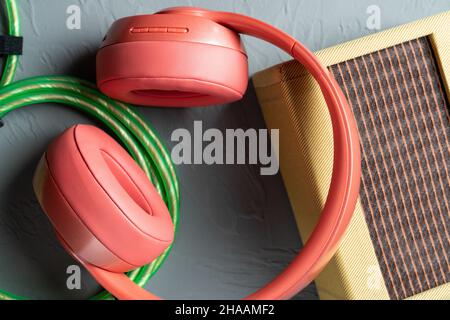 a red headphone on gray background Stock Photo