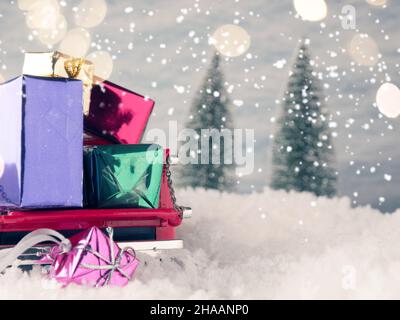 Old used red pickup truck with colorful gift boxes on the bed, seasonal concept image, winter scene Stock Photo