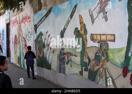 Hamas supporters during the commemoration of the occasion of the founding of the Islamist Hamas movement,  in Gaza Strip, on Dec 11, 2021. Stock Photo