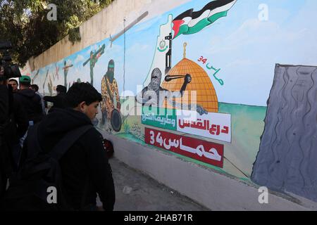 Hamas supporters during the commemoration of the occasion of the founding of the Islamist Hamas movement,  in Gaza Strip, on Dec 11, 2021. Stock Photo