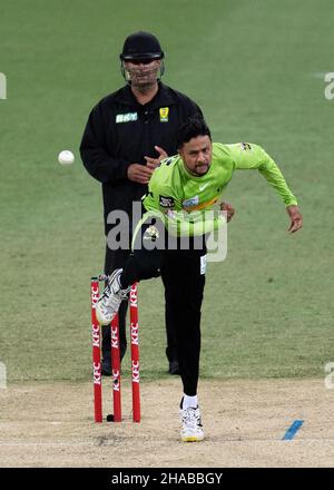 Sydney, Australia. 12th Dec, 2021. Tanveer Sangha of Thunder bowls during the match between Sydney Thunder and Melbourne Stars at Sydney Showground Stadium, on December 12, 2021, in Sydney, Australia. (Editorial use only) Credit: Izhar Ahmed Khan/Alamy Live News/Alamy Live News Stock Photo