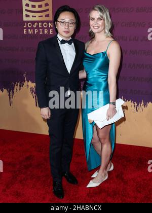Beverly Hills, United States. 11th Dec, 2021. BEVERLY HILLS, LOS ANGELES, CALIFORNIA, USA - DECEMBER 11: Actor Jimmy O. Yang and Bri Kimmel arrive at the 19th Annual Unforgettable Gala Asian American Awards held at The Beverly Hilton Hotel on December 11, 2021 in Beverly Hills, Los Angeles, California, United States. (Photo by Xavier Collin/Image Press Agency/Sipa USA) Credit: Sipa USA/Alamy Live News Stock Photo