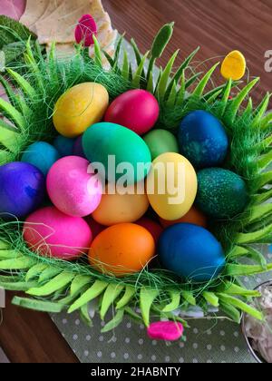 Happy Easter, Easter nest with colorful Easter eggs and heart Stock Photo