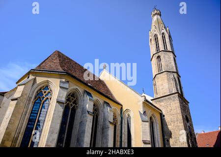 Goat The Blessed Mary Benedictine Church in Sopron on main square in Hungary on a sunny day Stock Photo