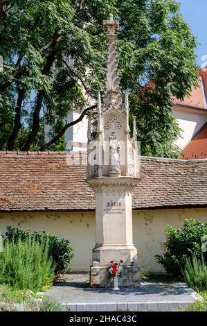 Statue of Saint Mary with infant Jesus in Szombathely, Hungary in front of the Saint Martin Church Stock Photo