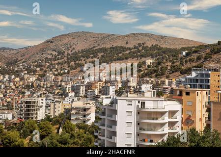 Cityscape with residential buildings and villas for rent in Saranda. South of Albania Stock Photo