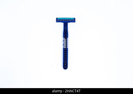Flat Lay Shot of A Blue Razor Bottom in The Minimalist White Background, Landscape Mode Stock Photo