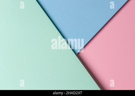 Abstract creative geometric pastel pink, light green and blue paper background with copy space Stock Photo