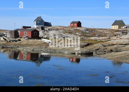 colourful wooden houses on the shores of Disko Bay, Western Greenland Stock Photo