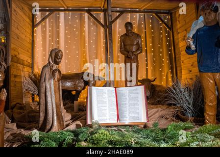 Christmas Manger scene with figurines including Jesus Stock Photo