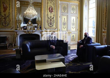 French President Emmanuel Macron attends a meeting with German Chancellor Olaf Scholz at the Elysee Palace in Paris, France, December 10, 2021. Photo by Sarah Meyssonnier/Pool/ABACAPRESS.COM Stock Photo