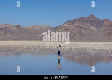 Bonneville Salt Flats are a densely packed salt pan in Tooele County in northwestern Utah. Stock Photo