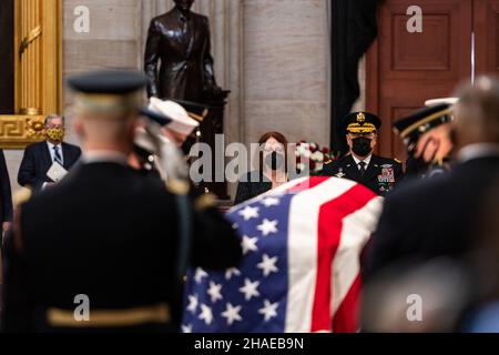 Washington, United States Of America. 09th Dec, 2021. Washington, United States of America. 09 December, 2021. U.S. Chairman of the Joint Chiefs Gen. Mark Milley, right, and members of Congress stand for a moment of respect for World War II veteran and former Senator Robert Dole, as his casket lies in state at the Rotunda of the U.S. Capitol, December 9, 2021 in Washington, DC Senator Dole died at age 98 following a lifetime of service to the nation. Credit: Sgt. Zachery Perkins/U.S. Army/Alamy Live News Stock Photo
