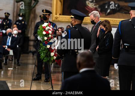 Washington, United States Of America. 09th Dec, 2021. Washington, United States of America. 09 December, 2021. U.S. Speaker of the House Nancy Pelosi and Minority Leader Kevin McCarthy pay respect to World War II veteran and former Senator Robert Dole as his flag draped casket lies in state at the Rotunda of the U.S. Capitol, December 9, 2021 in Washington, DC Senator Dole died at age 98 following a lifetime of service to the nation. Credit: Spc. Zachery Perkins/U.S. Army/Alamy Live News Stock Photo