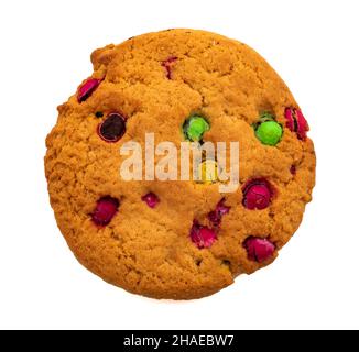 Snacks isolate close-up. Cookies interspersed with colored balls on a white background Stock Photo