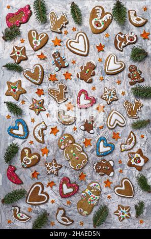Christmas sweets on wooden table. Gingerbread cookies, dried oranges, spices. Decorates a festive Christmas table eco friendly decor with dried fruit Stock Photo