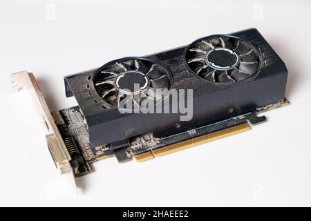 Dirty dusty graphics card in dust on a white background Stock Photo