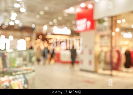 Blurry soft and out of focus people in the hypermarket. High quality photo Stock Photo