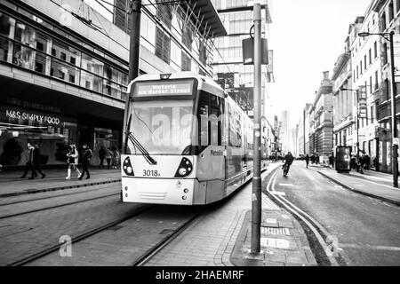 MANCHESTER, ENGLAND- 27 November 2021: Tram on New York Street in Manchester, England Stock Photo