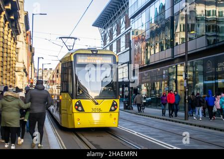 MANCHESTER, ENGLAND- 27 November 2021: Tram on New York Street in Manchester, England Stock Photo