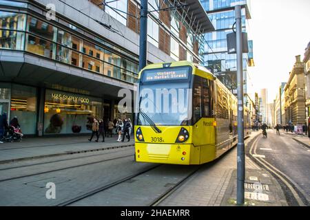 MANCHESTER, ENGLAND- 27 November 2021: Tram on New York Street in Manchester, England Stock Photo