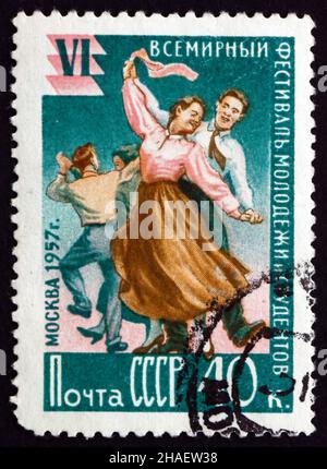 RUSSIA - CIRCA 1957: a stamp printed in the Russia shows Young Couples Dancing, 6th World Youth Festival in Moscow, circa 1957 Stock Photo