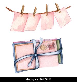 Watercolor set with pink carg on a rope, envelope and paper sheets. Pile of old envelopes with ribbon bow. Stock Photo