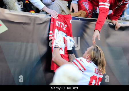 Cincinnati, Ohio, USA. 12th Dec, 2021. San Francisco 49ers tight end George Kittle (85) autographs a fans jersey prior to the kickoff at the NFL football game between the San Francisco 49ers and the Cincinnati Bengals at Paul Brown Stadium in Cincinnati, Ohio. JP Waldron/Cal Sport Media/Alamy Live News Stock Photo