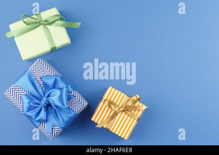 Present in gift paper on the table. Stock Photo