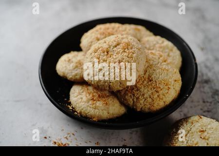 Homemade Coconut cookies or Indian crispy biscuits , selective focus Stock Photo