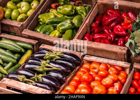 Drawers with vegetables in a greengrocery. Stock Photo