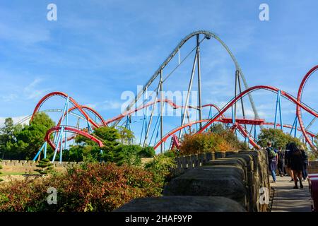 SALOU, SPAIN - Oct 31, 2021: The high roller coaster Shambahla against a cloudy sky in PortAventura park, Salou, Spain Stock Photo