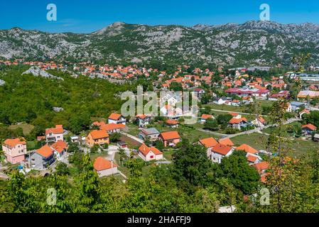 Njegusi village ,a sunny landscape in southwest Montenegro in late summer,pretty houses with terracotta tiled roofs and whitewashed walls amongst lush Stock Photo