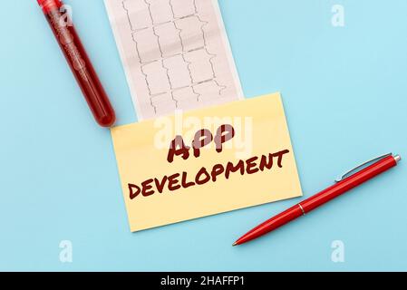 Text caption presenting App Development. Business idea Development services for awesome mobile and web experiences Reading Graph And Writing Important Stock Photo