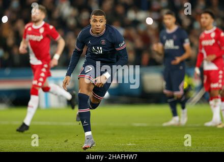 Paris, France. 12th Dec, 2021. Kylian Mbappe of Paris Saint-Germain competes during the Ligue 1 match between Paris Saint-Germain and Monaco in Paris, France, Dec. 12, 2021. Credit: Xinhua/Alamy Live News Stock Photo