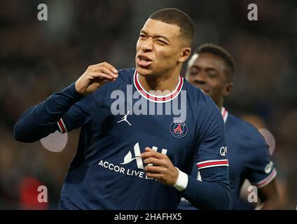 Paris, France. 12th Dec, 2021. Kylian Mbappe of Paris Saint-Germain reacts during the Ligue 1 match between Paris Saint-Germain and Monaco in Paris, France, Dec. 12, 2021. Credit: Xinhua/Alamy Live News Stock Photo