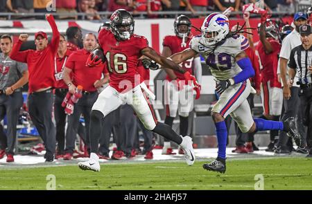 Tampa, United States. 12th Dec, 2021. Tampa Bay Buccaneers' Breshad Perriman (16) races past Buffalo Bills' Tremaine Edmunds (49) for the end zone to score the game-winning touchdown during overtime at Raymond James Stadium in Tampa, Florida on Sunday, December 12, 2021. Photo by Steve Nesius/UPI Credit: UPI/Alamy Live News Stock Photo