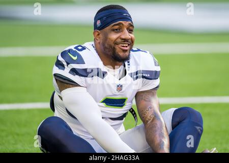 Houston, TX, USA. 12th Dec, 2021. Seattle Seahawks defensive end Darrell  Taylor (52) sacks Houston Texans quarterback Davis Mills (10) during the  4th quarter of an NFL football game between the Seattle