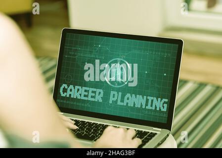 Sign displaying Career Planning. Business showcase Strategically plan your career goals and work success Woman Sitting With Laptop Back View Actively Stock Photo